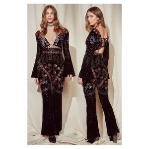 **Never Been Worn + Tags**
Nasty Gal Studio Donna Velvet Embellished Jumpsuit